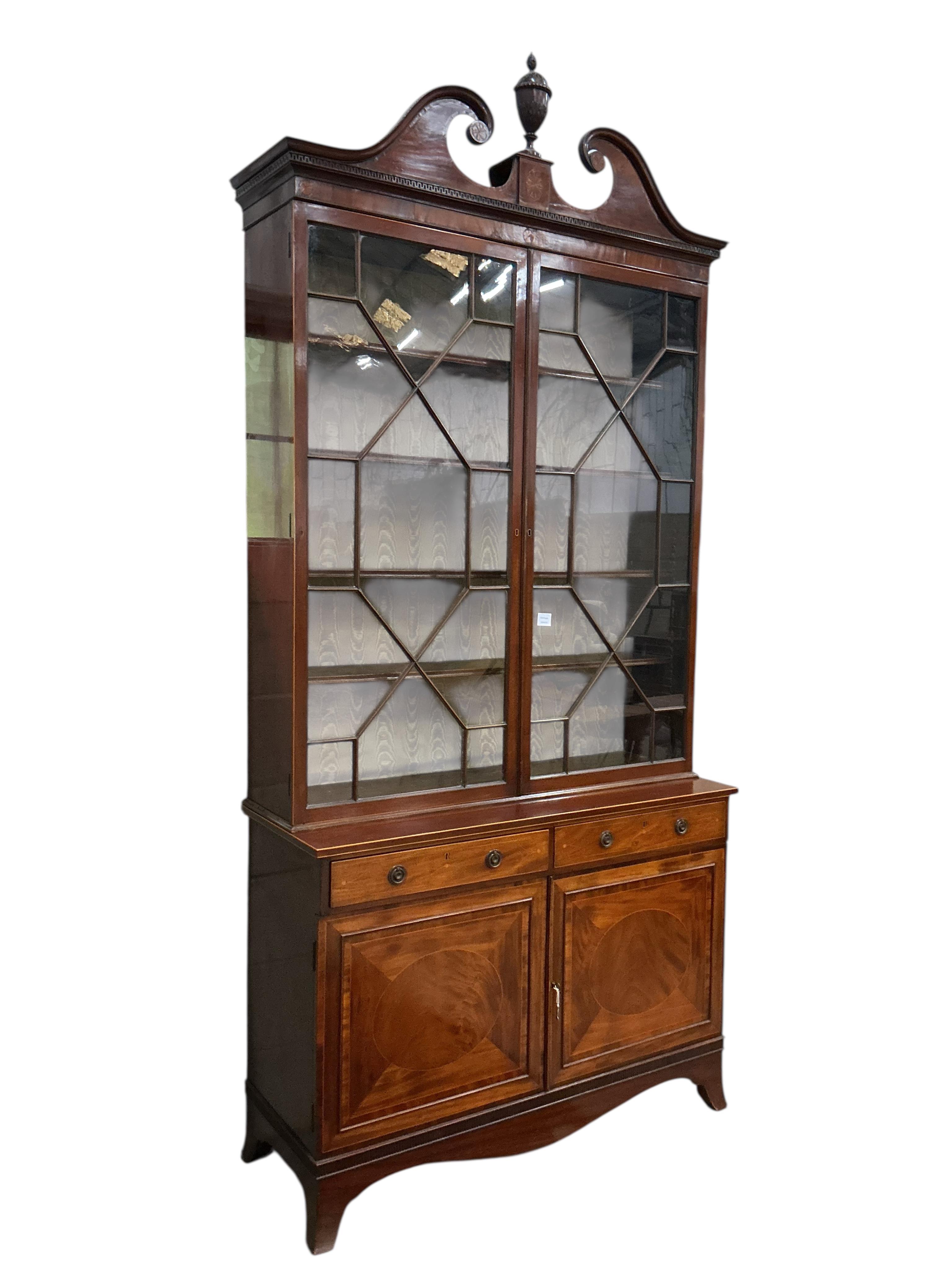 A George III and later inlaid mahogany library bookcase, width 130cm, depth 46cm, height 270cm